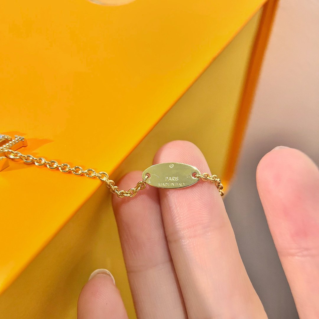 TimiLOGO STAR MOTIF GOLD BRACELET