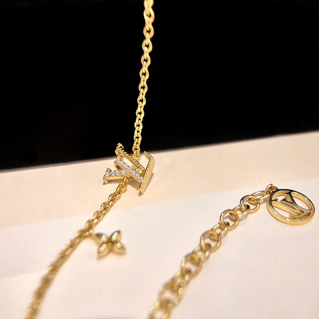 TimiLOGO STAR MOTIF GOLD BRACELET