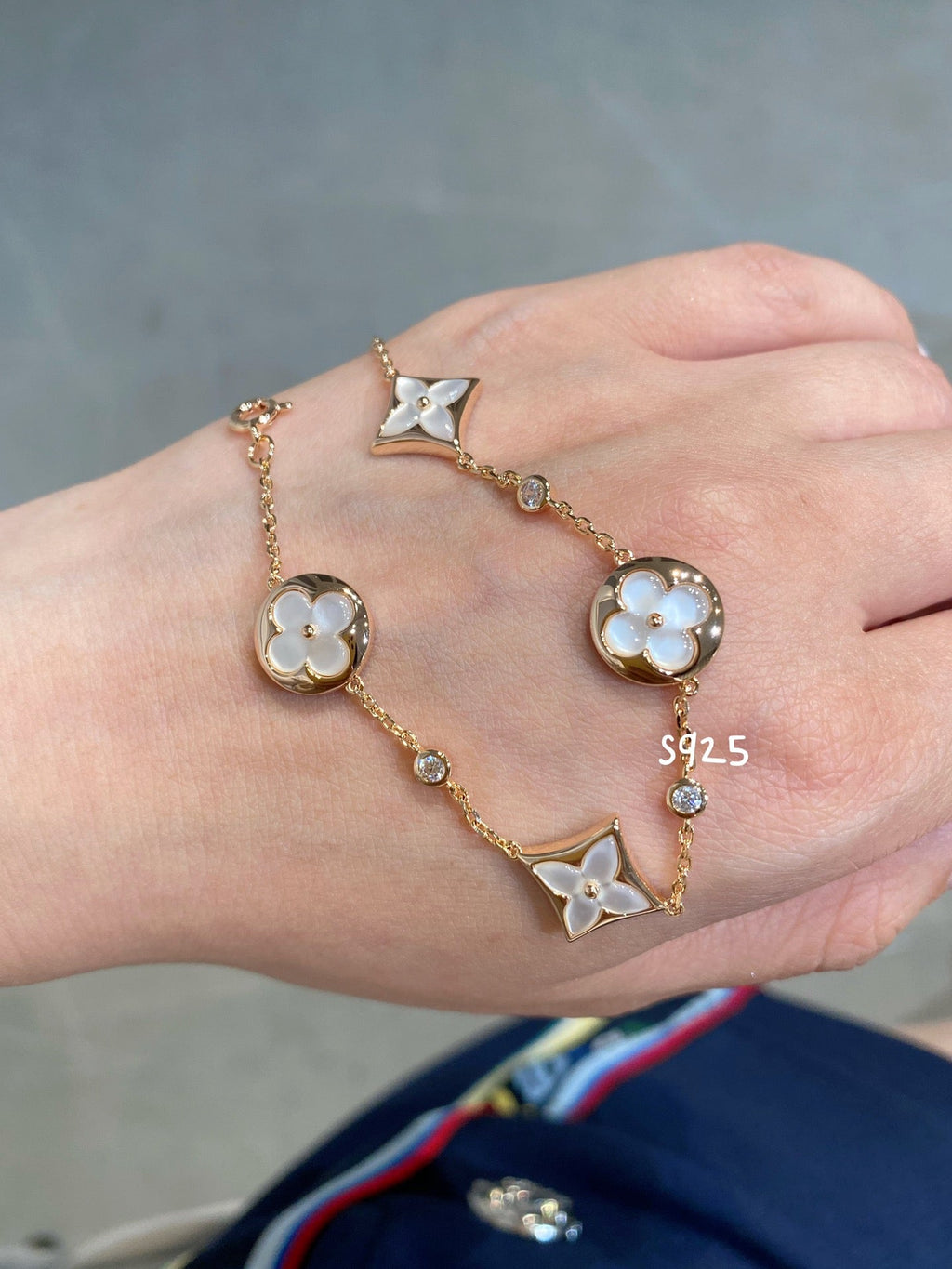 TimiSTAR AND SUN 4 MOTIF WHITE MOP PINK GOLD BRACELET