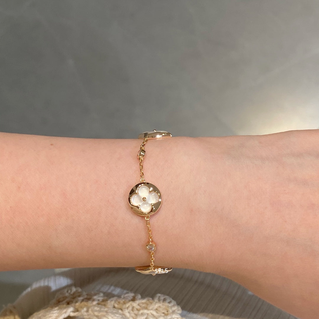 TimiSTAR AND SUN 4 MOTIF WHITE MOP PINK GOLD BRACELET
