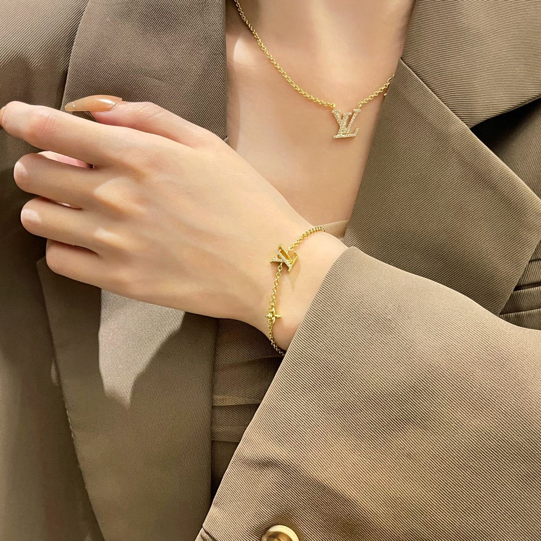 TimiLOGO STAR MOTIF GOLD BRACELET